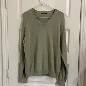 Brandy Melville light green v-neck sweater 
No size - I would say M to L